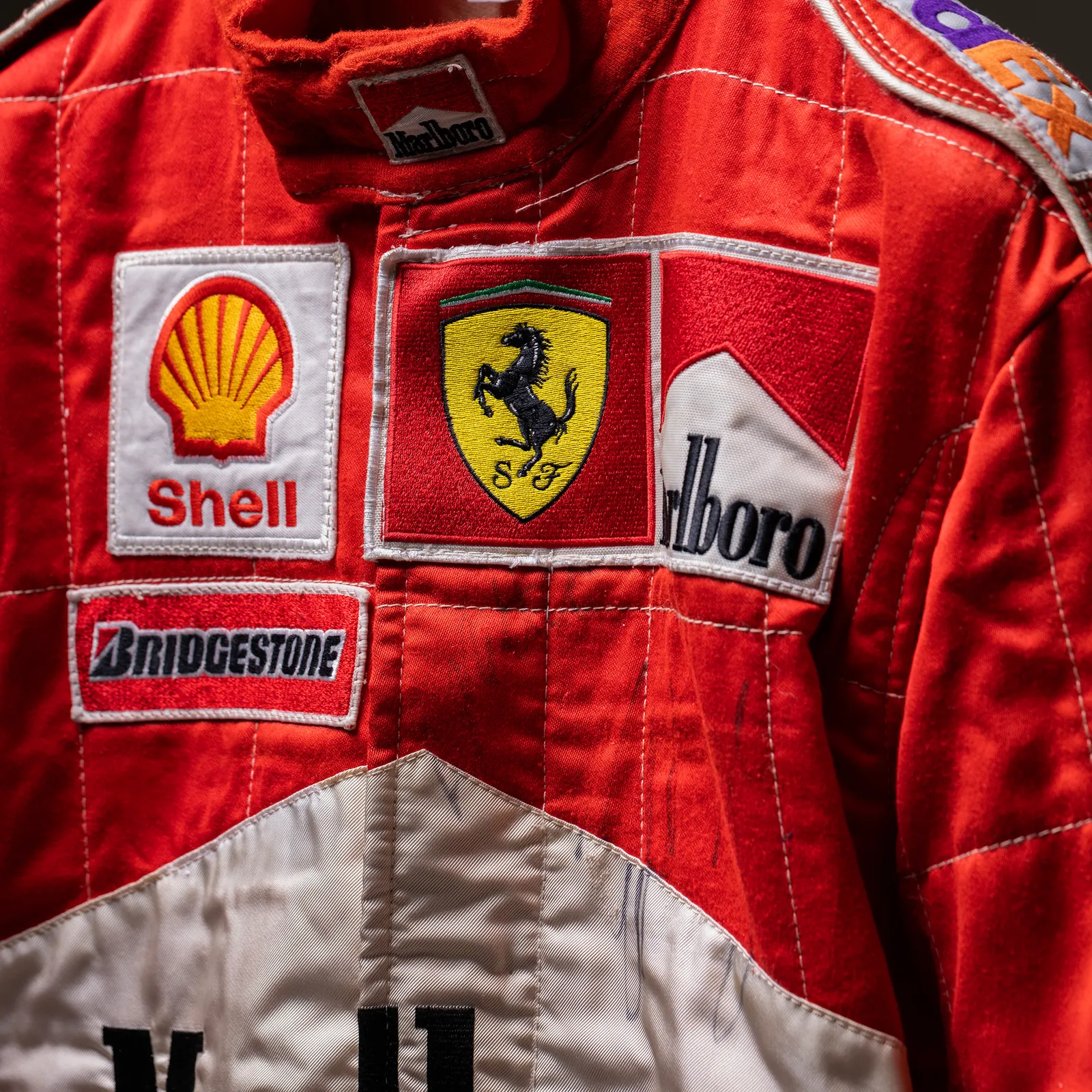 Tuta Eddie Irvine 1999 autografata